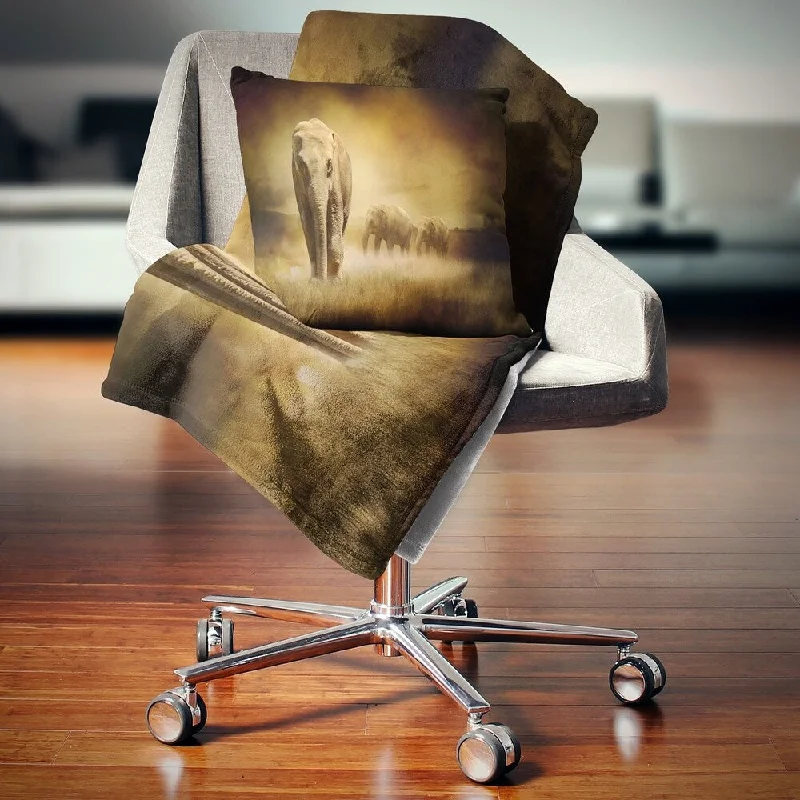 Linen blankets with a rustic and textured lookLinen blankets with a rustic and textured lookDesignart 'Elephants at Sunset' Animal Throw Blanket