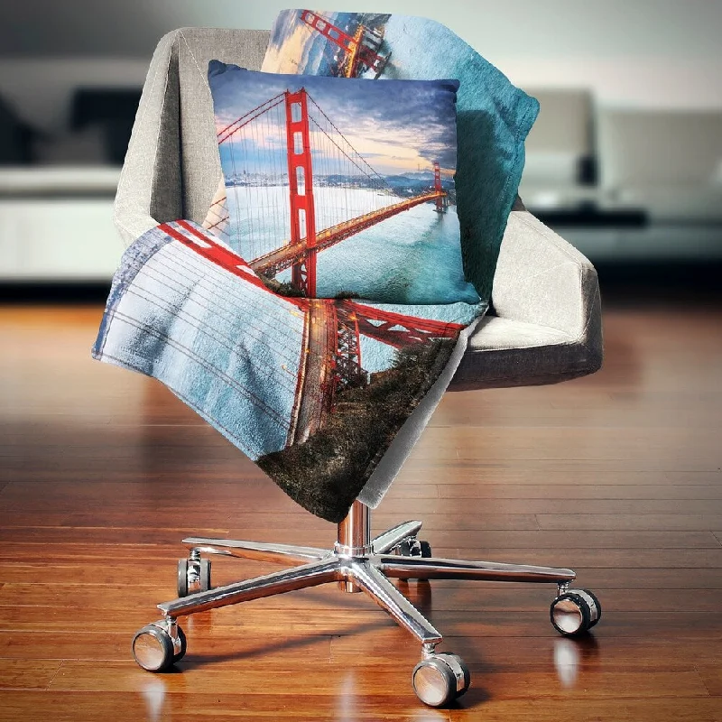 Cotton blankets for breathability and a lightweight feelCotton blankets for breathability and a lightweight feelDesignart 'Golden Gate under Cloudy Sky' Sea Bridge Throw Blanket