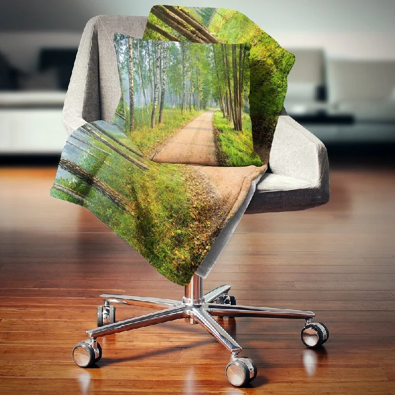 Fleece blankets for a cozy and plush textureFleece blankets for a cozy and plush textureDesignart 'Road in Green Morning Forest' Landscape Photo Throw Blanket