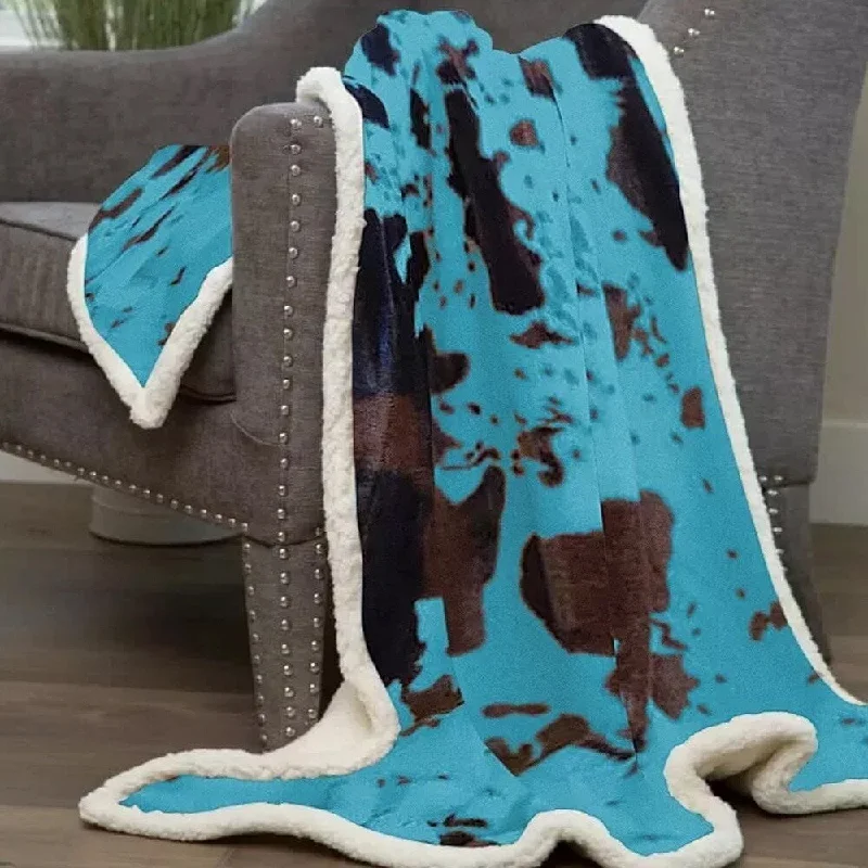 Linen blankets with a rustic and textured lookLinen blankets with a rustic and textured look54" x 68" Cowhide Sherpa Throw Blanket Turquoise