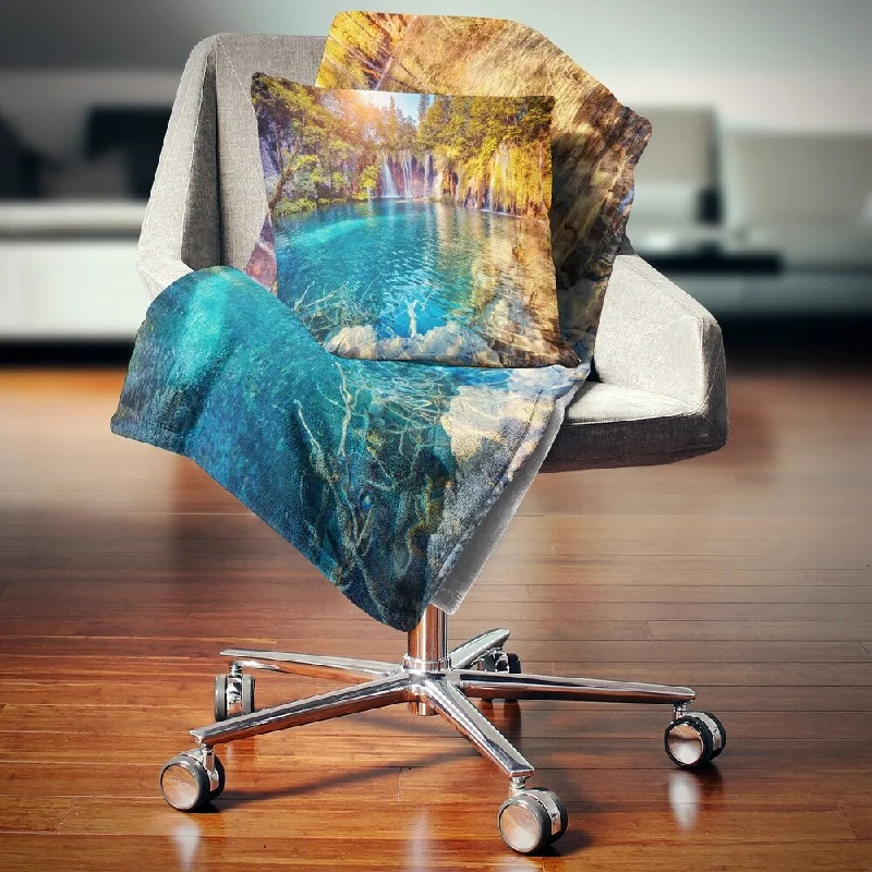 Acrylic blankets for a soft and affordable alternativeAcrylic blankets for a soft and affordable alternativeDesignart 'Turquoise Water and Sunny Beams' Landscape Photography Throw Blanket