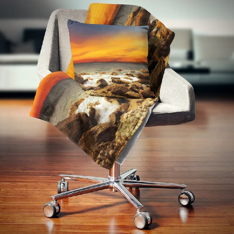 Recycled polyester blankets for an eco - conscious optionRecycled polyester blankets for an eco - conscious optionDesignart 'Red Sky over Rocky Seashore' Beach Photography Throw Blanket