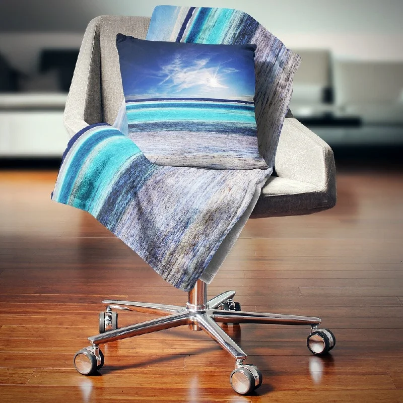 Fleece blankets for a cozy and plush textureFleece blankets for a cozy and plush textureDesignart 'Crystal Clear Sea under Sunlight' Seashore Throw Blanket