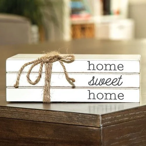 Bed skirts with a multi - colored patternHome Sweet Home Stacked Books