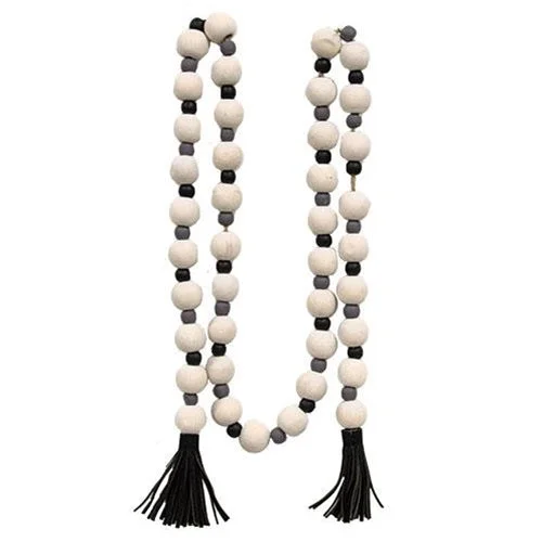 Bed skirts with a bohemian - inspired patternDistressed Black White & Gray Bead Garland w/Tassels Bed skirts with a bohemian - inspired patternDistressed Black White & Gray Bead Garland w/Tassels