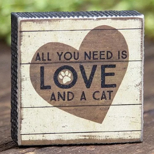 Bed skirts with a herringbone pattern for a sophisticated lookLove and a Cat Box Sign