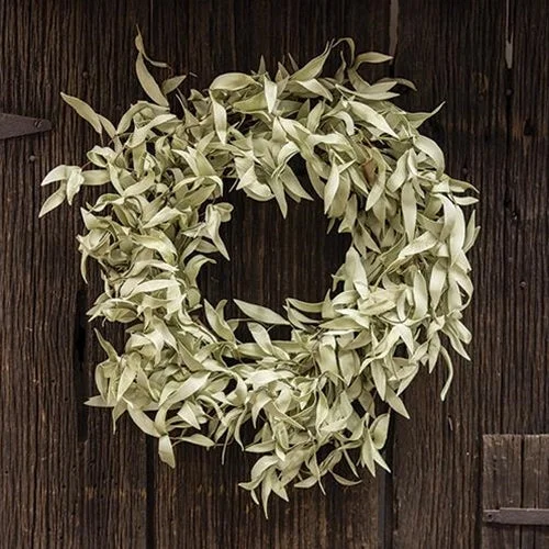 Bed skirts with a geometric cut - out designFlocked Leaves Wreath 24"