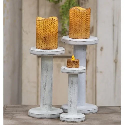 Bed skirts with a lace trim for a romantic touchFarmhouse White Spool Candleholder 10.75"