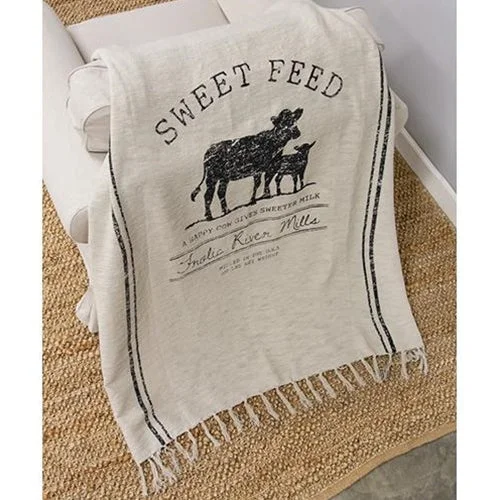 Bed skirts with a scalloped hem for a charming detailSweet Feed Farmhouse Throw